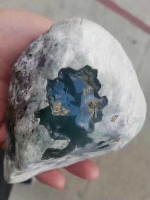 木那包浆皮玻璃种带晴底翡翠原石